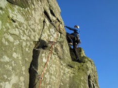 Climbing Sickle Buttress (HVD**) at Froggatt Edge on a brilliantly sunny March day.