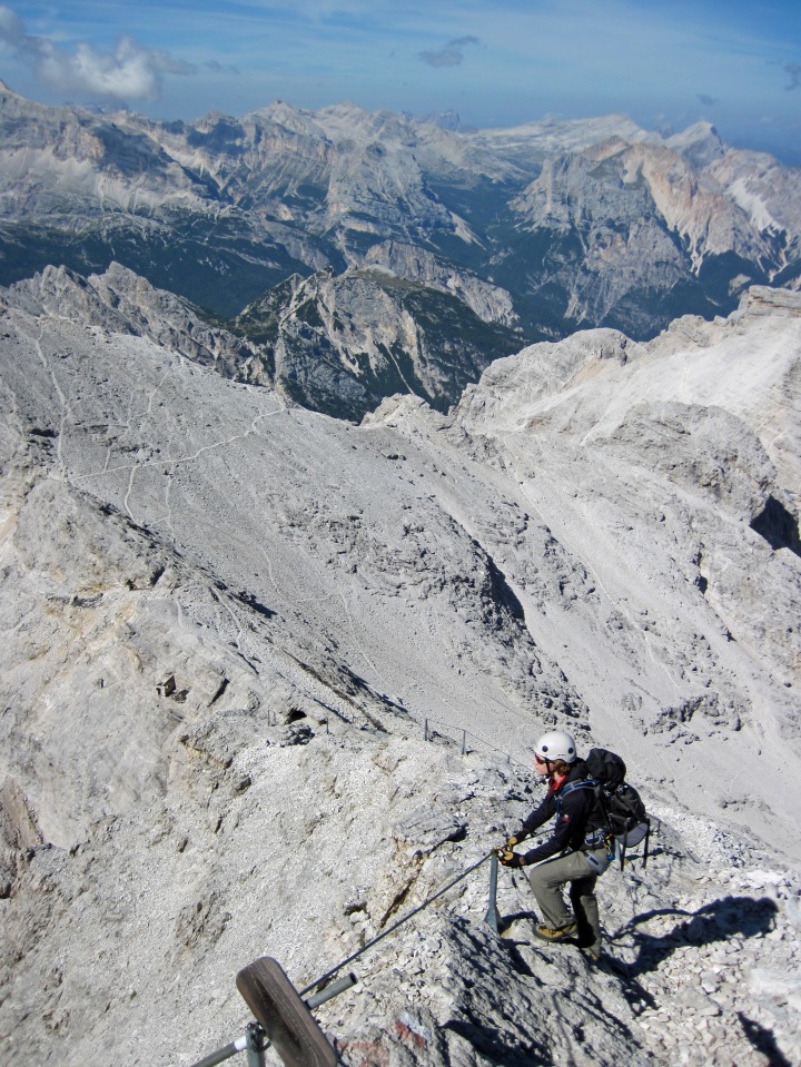 Valerie climbing the Via Ferrata Ivano Dibona in the Dolomites.
