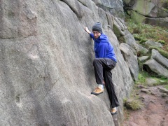 Me making the first few moves on the Slab 2 problem on Blister Slab.