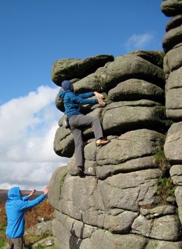 Me climbing The Runnel problem at Hound Tor.