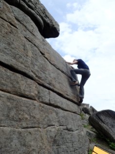 Climbing the problem Tweedle Dum (VB 4a) at Stanage Far Right.