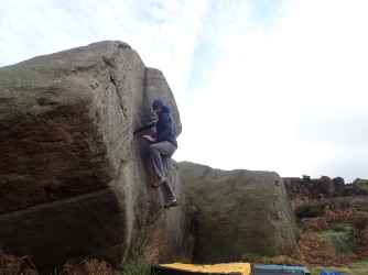Trying again (and failing again) to climb the problem Right Whale (V0 4c) on The Whale boulder at Burbage South Valley.